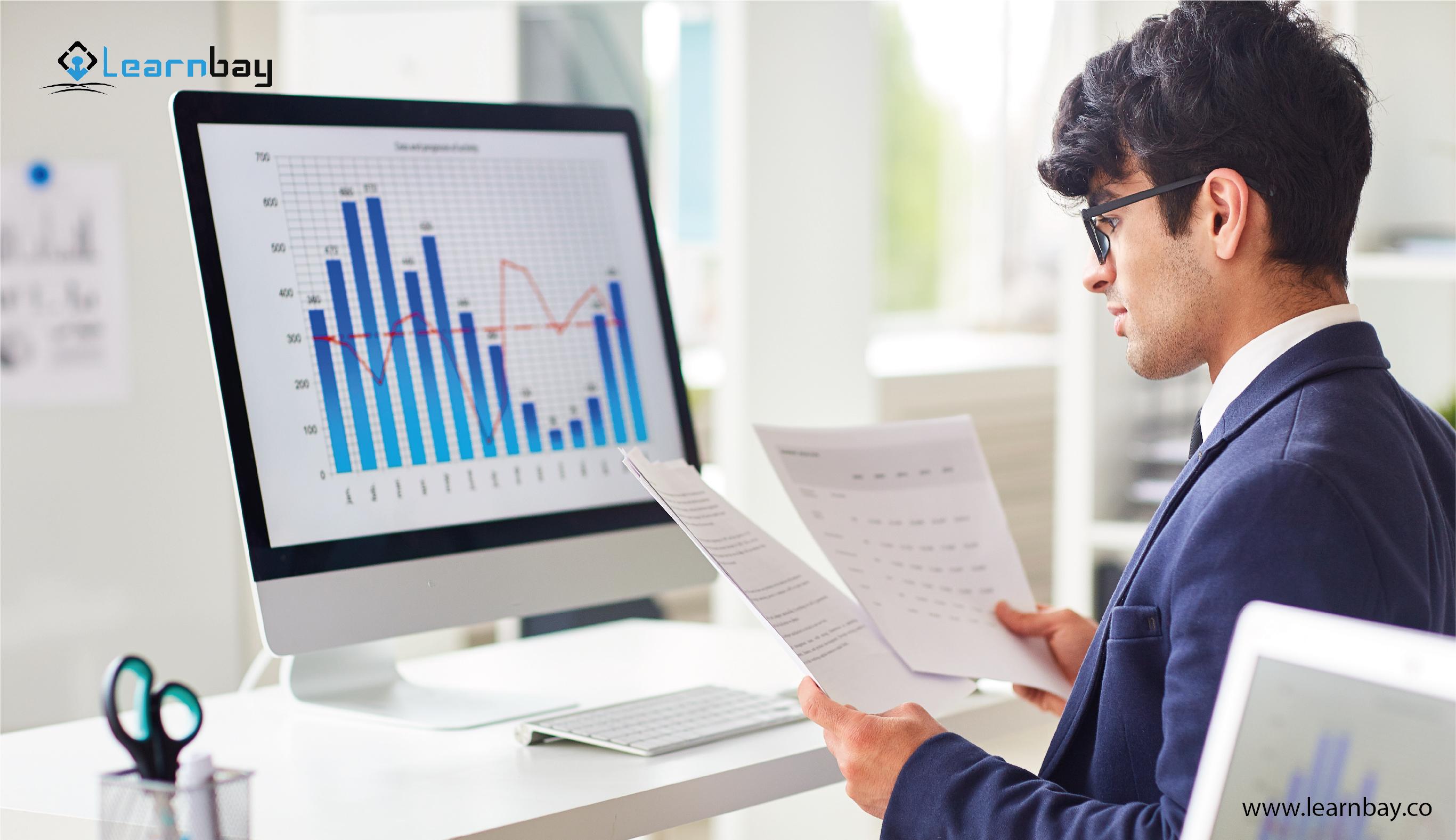 A data science aspirant seated in front of a laptop analyzes numerous data science interview preparations.